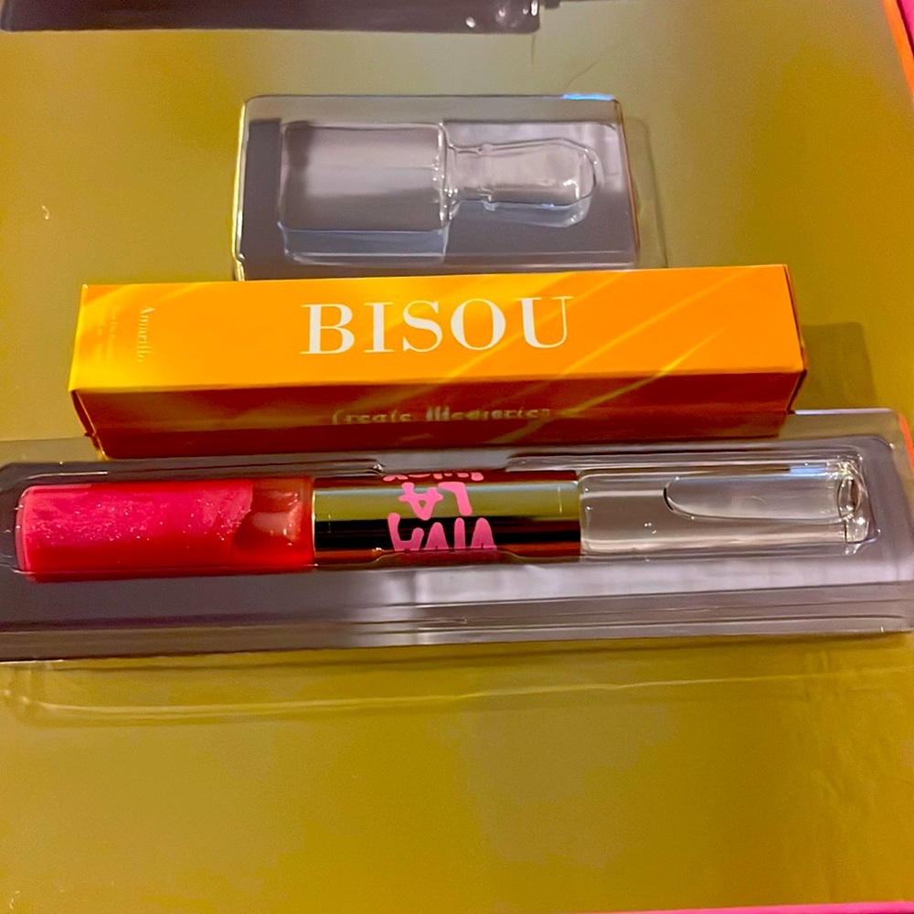 Two rollerball perfumes: Viva La Juicy and another from Bisou called Amarillo